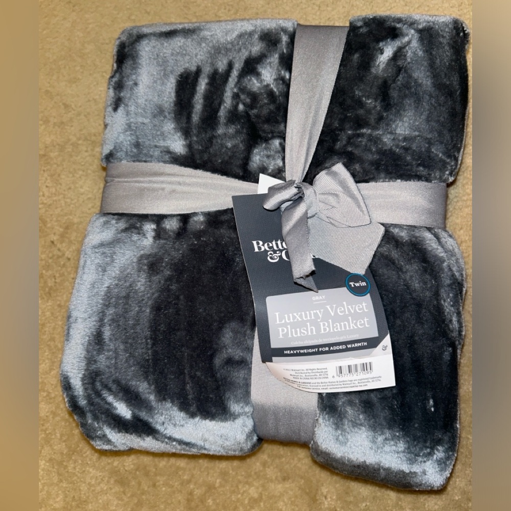 Brand new, unopened twin size plush throw blanket